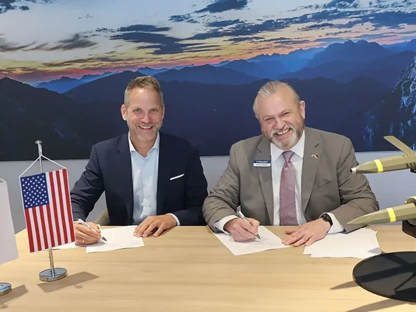 Roman Koehne and General Atomics Electromagnetic Systems President Scott Forney